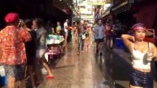Songkran Festival in soi Cowboy. Girls playing water, 2016.